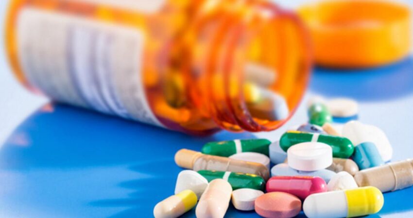 medicine box tablets on table